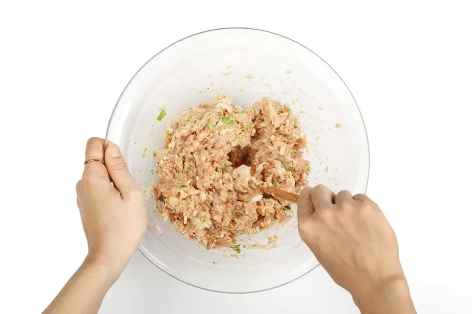 ground chicken mixing bowl breadcrumbs egg