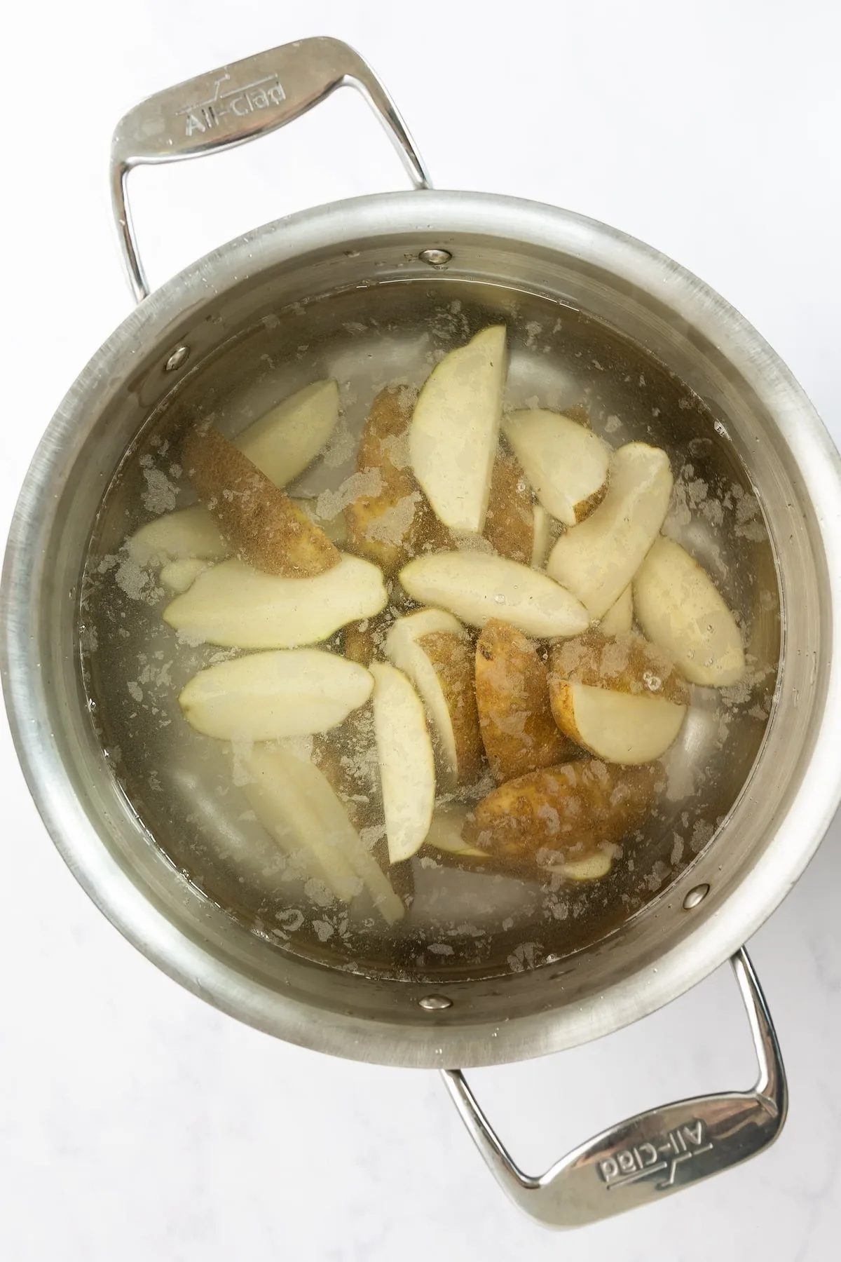 Parboiling potatoes